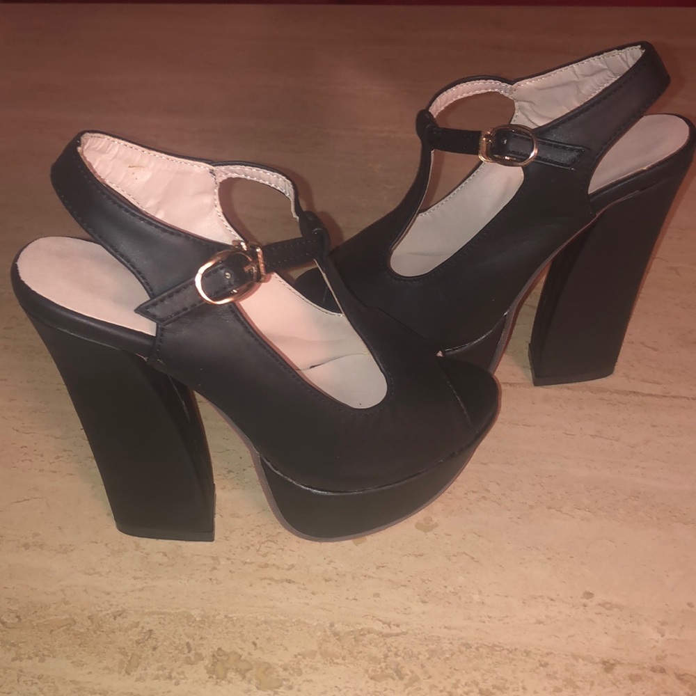 Black. Sexy, high heeled platforms.